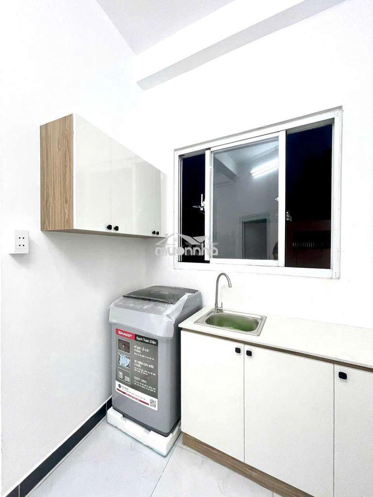Dạng căn hộ dịch vụ tách bếp cửa sổ to siêu đẹp ngay mặt tiền đường - 2