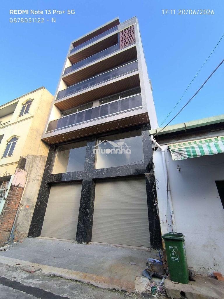 Cho thuê văn phòng khu gò dầu 8*20m hầm 7 lầu giá 90tr