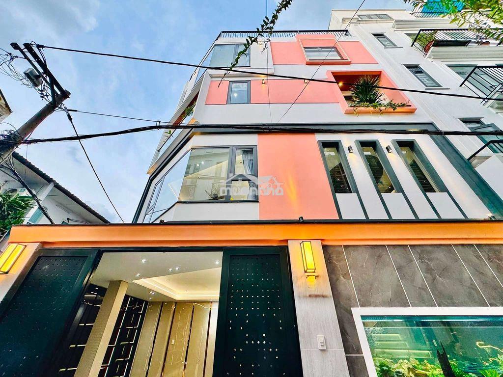 Nhà xây mới 5 tầng 57.3m2 căn góc 2 mặt đường số 30, ngay chợ an nhơn - 2