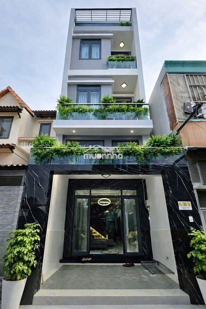 Bán nhà hẻm xe hơi quận 7: 4x16m, 2 lầu, sân thượng, nội thất cao cấp