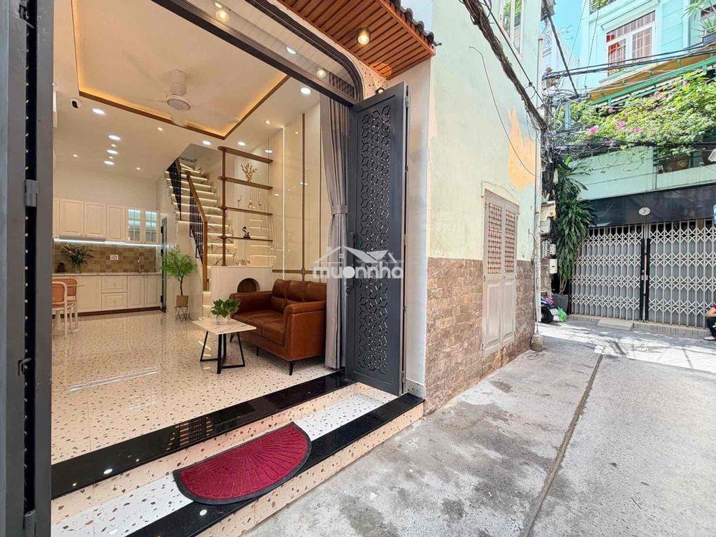 Bán nhà 5 tầng- dts: 100m2 - hẻm thông- ngay huỳnh văn bán - phú nhuận - 2