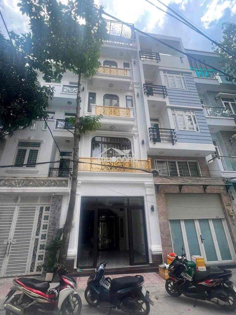 Nhà mới xây 100% 4lầu 5pn - có thang máy - 980 nguyễn duy trinh q9