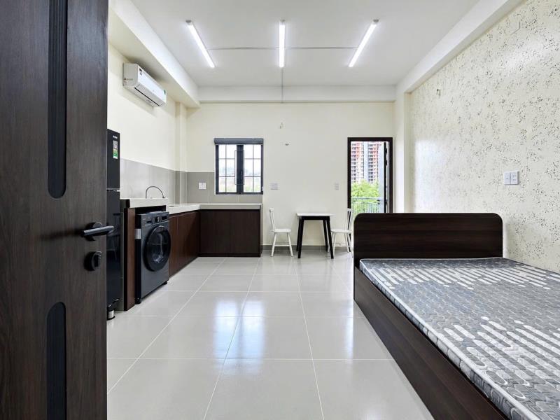 Cho thuê chung cư mini 45m2 ban công giặt riêng, bếp có hút mùi gần phan xích long, trường sa - quận 1 quận 3 full nội thất, mới 100%, có thang thoát hiểm, thang máy